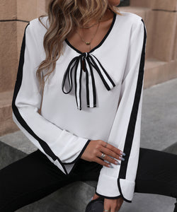 Blouse avec bordure noire